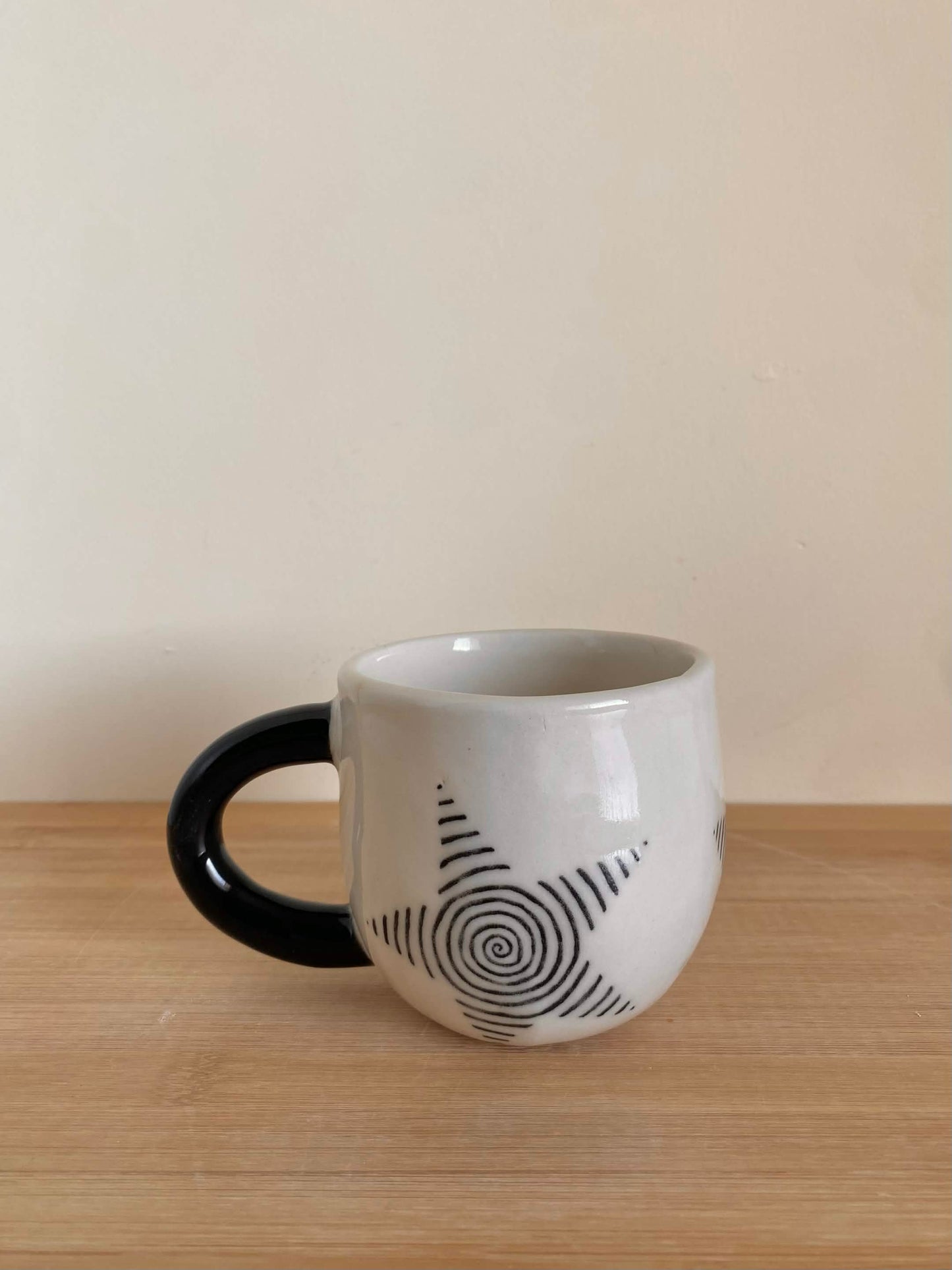Black Spiral Star Mug