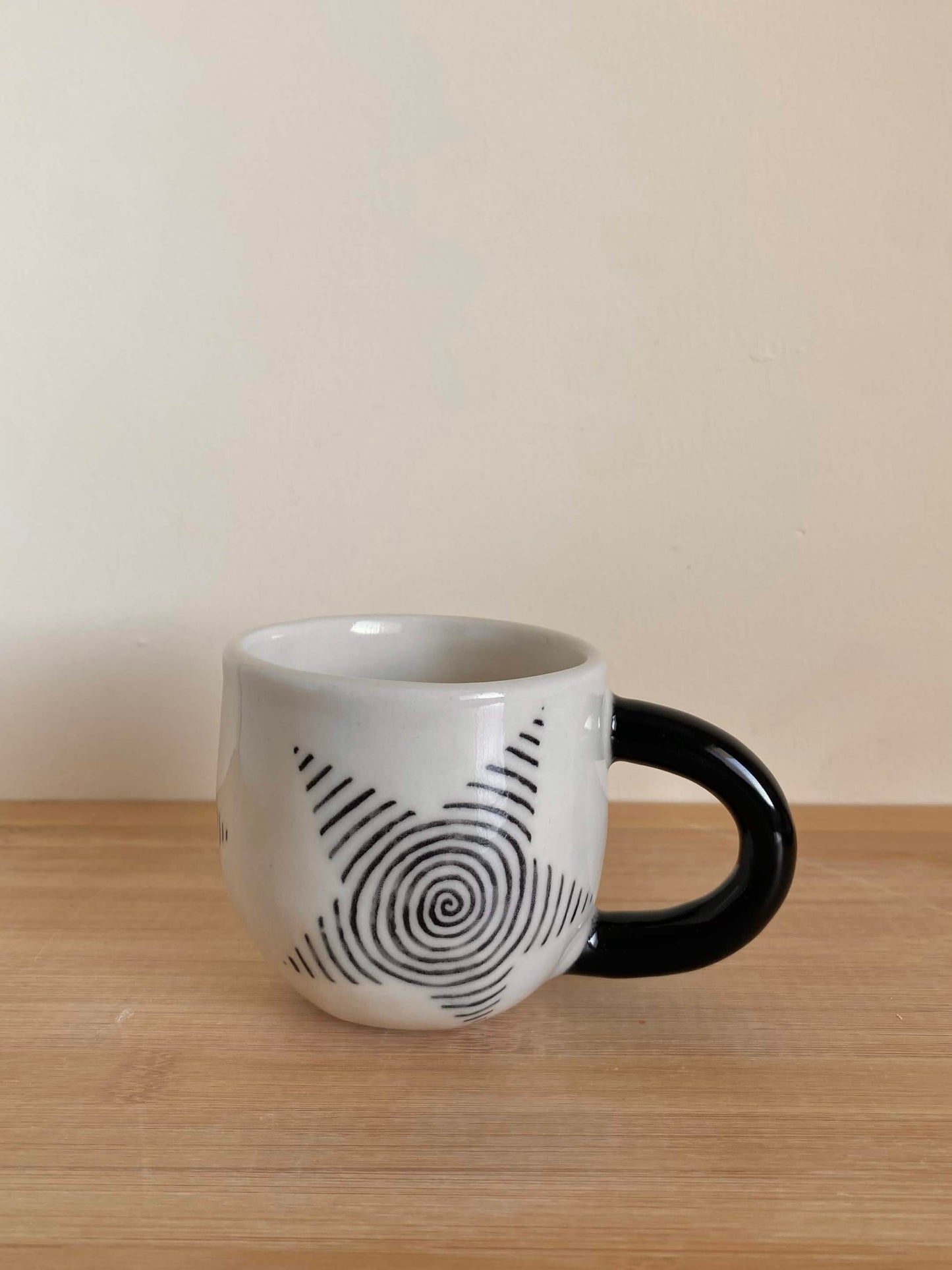 Black Spiral Star Mug